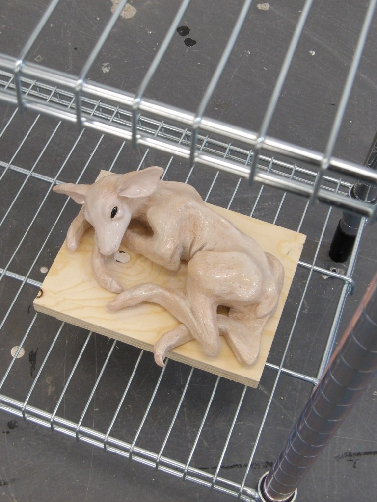Ceramic deer sculpture